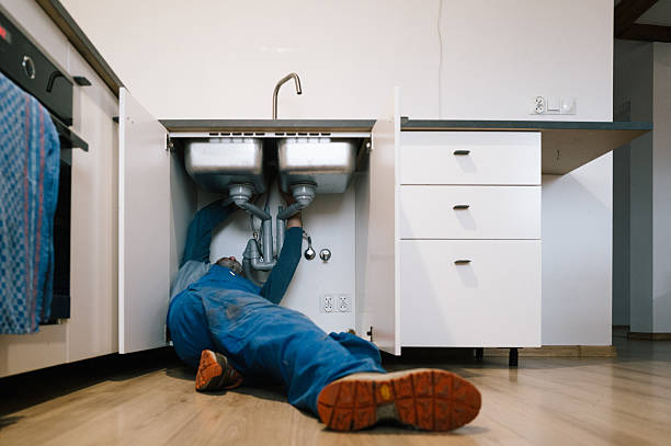 Professional Emergency Plumber technician working in Fuquay-Varina, NC